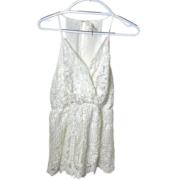 Entro White‎ Lace Jumpsuit with Plunging V-Neck - Picture 2 of 6